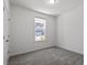 Bedroom showing a white door and window at 3424 Writt Ct, New Hill, NC 27562