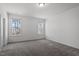 Bedroom with plush carpeting, a ceiling light and two windows at 3424 Writt Ct, New Hill, NC 27562