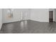 View of a living room with hardwood floors, neutral colors, and natural light at 3424 Writt Ct, New Hill, NC 27562
