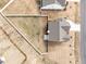 Birds-eye view of a backyard with patio and white vinyl fencing, showcasing the outdoor living space at 350 Arlie Ln, Lillington, NC 27546