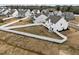 Large backyard with white vinyl fencing and patio, perfect for outdoor activities and privacy at 350 Arlie Ln, Lillington, NC 27546