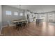 Open kitchen and dining area with white cabinets and a spacious island at 350 Arlie Ln, Lillington, NC 27546
