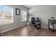 Bright home office with wood floors, natural light, and desk setup at 350 Arlie Ln, Lillington, NC 27546