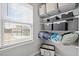 Closet with shelving, baskets and storage containers and a window at 350 Arlie Ln, Lillington, NC 27546