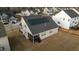 Aerial view of home with solar panels on roof at 363 Grey Hawk Dr, Garner, NC 27529