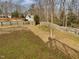 Large, fenced backyard with a storage shed and plenty of space for outdoor activities at 4023 Cashew Dr, Raleigh, NC 27616
