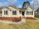 Charming single-story home featuring a well-manicured lawn and inviting entrance at 4023 Cashew Dr, Raleigh, NC 27616
