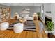 Stylish living room boasts hardwood floors and elegant fireplace at 4023 Cashew Dr, Raleigh, NC 27616
