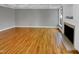 Spacious living area showcases hardwood floors and a cozy fireplace at 4023 Cashew Dr, Raleigh, NC 27616