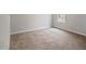 Spacious bedroom with carpeted floor and natural light at 4201 Hampstead Village Dr, Durham, NC 27703