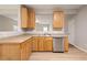Well-equipped kitchen featuring stainless steel appliances and beautiful wood cabinets and lots of light at 4201 Hampstead Village Dr, Durham, NC 27703