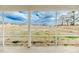 Expansive fenced backyard view from a screened porch for outdoor enjoyment at 430 St. Claire Dr, Fuquay Varina, NC 27526