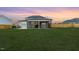 Spacious backyard featuring a covered patio perfect for outdoor entertaining and relaxation at 430 St. Claire Dr, Fuquay Varina, NC 27526