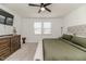 Comfortable bedroom with a king-size bed, dark wood furniture, and soft carpeting at 430 St. Claire Dr, Fuquay Varina, NC 27526
