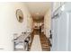 Bright foyer with wood floors, stylish decor, and an open view into the living area at 430 St. Claire Dr, Fuquay Varina, NC 27526
