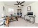 Home office featuring a desk, shelving, and natural light, creating a productive workspace at 430 St. Claire Dr, Fuquay Varina, NC 27526