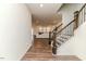 Elegant staircase with dark wood and iron railing, leading to the upper level at 430 St. Claire Dr, Fuquay Varina, NC 27526