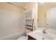 Bathroom featuring a shower-tub combo, vanity, and a modern mirror at 521 Eastway Ave # Apt B, Durham, NC 27703