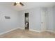 Simple bedroom with neutral walls, carpet and an ensuite bathroom at 521 Eastway Ave # Apt B, Durham, NC 27703