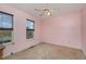 Bedroom with two large windows allowing natural light to enter the room at 521 Eastway Ave # Apt B, Durham, NC 27703