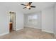 Spacious bedroom with a window, carpet flooring and ensuite bathroom at 521 Eastway Ave # Apt B, Durham, NC 27703