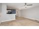 Bright, neutral living area showcasing the floor plan and ceiling fan at 521 Eastway Ave # Apt B, Durham, NC 27703