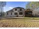 Home featuring a large backyard and screened-in porch at 5609 Abbey Grace Ln, Wake Forest, NC 27587