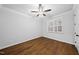 Comfortable bedroom with hardwood floors and bright natural light at 5609 Abbey Grace Ln, Wake Forest, NC 27587
