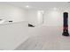 This basement is finished with carpet and features a punching bag at 616 Long Lake Dr, Fuquay Varina, NC 27526