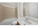 Clean bathroom with tiled shower and tub combo, a white vanity, and modern fixtures at 616 Long Lake Dr, Fuquay Varina, NC 27526