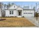Attractive home with a well-manicured lawn and modern architecture at 616 Long Lake Dr, Fuquay Varina, NC 27526
