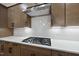 Contemporary kitchen with granite countertops, stainless steel appliances, and a modern gas range at 616 Long Lake Dr, Fuquay Varina, NC 27526