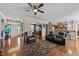 Inviting living room with hardwood floors, opening up to kitchen and dining areas at 64 Old Barn Way, Wendell, NC 27591