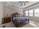 Spacious main bedroom with tray ceiling, neutral walls, and plush carpeting at 64 Old Barn Way, Wendell, NC 27591