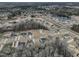 Aerial view of the Jones Farm community and surrounding neighborhood, showcasing the many houses at 76 Freewill Pl, Raleigh, NC 27603