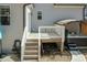 Outdoor deck with stairs, convenient access to a relaxing hot tub at 76 Freewill Pl, Raleigh, NC 27603