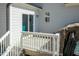Outdoor deck with stairs, convenient access to sliding glass doors at 76 Freewill Pl, Raleigh, NC 27603