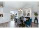 Inviting dining room with a stylish table, comfortable chairs, and natural light at 76 Freewill Pl, Raleigh, NC 27603