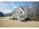 Well-maintained two-story home with a lush front lawn, perfect for outdoor activities at 76 Freewill Pl, Raleigh, NC 27603