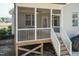 Beautiful screened porch with ceiling fan and access to backyard at 76 Freewill Pl, Raleigh, NC 27603
