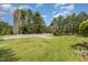Expansive backyard featuring a large silo and a white picket fence with room for various outdoor activities at 8324 Humie Olive Rd, Apex, NC 27502