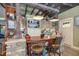Kitchen features an island with bar seating, custom cabinets, and stone accents at 8324 Humie Olive Rd, Apex, NC 27502