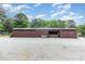 Large storage building with multiple bays, offering ample space for equipment and materials at 8324 Humie Olive Rd, Apex, NC 27502