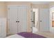 Bedroom features two closets, a window, and carpeted floors at 8912 Riverview Park Dr, Raleigh, NC 27613