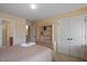 Comfortable bedroom featuring a queen size bed, desk and built in storage at 8912 Riverview Park Dr, Raleigh, NC 27613