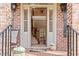Welcoming foyer with a staircase, showcasing the home's open layout and elegant design at 8912 Riverview Park Dr, Raleigh, NC 27613