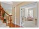 Home office featuring natural light, neutral walls, and French doors, offering a quiet workspace at 8912 Riverview Park Dr, Raleigh, NC 27613