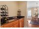 A wet bar featuring wine storage offers a place for drinks in the home at 8912 Riverview Park Dr, Raleigh, NC 27613