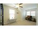 Bedroom featuring a desk and great natural lighting at 100 E Delafield Ave, Durham, NC 27704