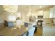 Updated kitchen features stainless steel appliances, granite countertops, and a stylish island at 100 E Delafield Ave, Durham, NC 27704